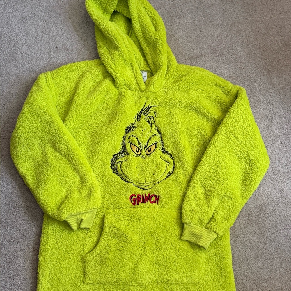 NWT never worn Grinch sweatshirt. Super cute.